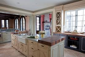 Painted kitchen cabinets are back with a bang! Black Green Off White Cabinets In French Country Kitchen Hgtv