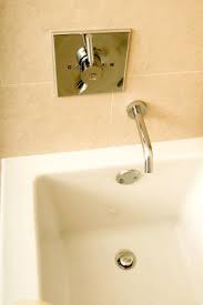 When a tub won't hold water, the two potential causes are easily repaired. How To Remove An Old Lever Style Bath Tub Drain Stopper