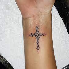 The combination of the beads and the hanging cross to the designs makes the design to really stand out in such a great way. 50 Unique Small Cross Tattoo Designs Simple And Lovely Yet Meaningful