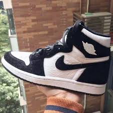 Jordan 1 Low White Lucky Green Black A First Look At The Air Jordan 1 Retro High Og Black White With Faux Fur Overlays Dr Wong Emporium Of Tings Web Magazine Air Jordans Sneakers Jordan 1 Retro High