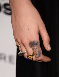 Download free cara delevingne shows off new finger tattoo of a lion's head to use and take to your artist. Cara Delevingne The 20 Most Stylish Celebrity Tattoos We Ve Ever Seen Popsugar Fashion Photo 2