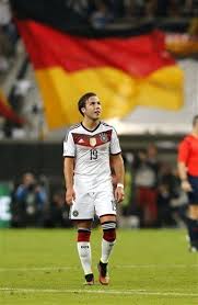 Germany S Mario Goetze Born 3 June 1992 Walks In Front Of A German Flag During The Friendly Soccer Match Between Germany And Argentina In Dues Germany Football