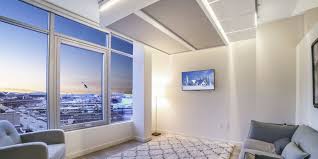 The custom upholstered storage bench with pillows at the end of the room and crystal chandelier finishes this room beautifully. Living In The Upside Down Bumblebee S Ceiling Suspended Furniture Designs Ideas On Dornob