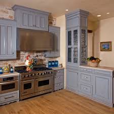 Blue gray kitchen cabinets barn wood accent wall. Beautiful Blue Kitchen Design Ideas