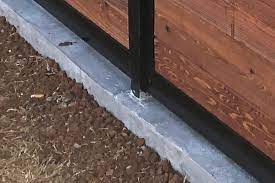 If you do go with wooden posts, make them a couple of inches less apart than the lengths of the 2x4's. How To Install A Fence Mounted To Concrete A Better Approach
