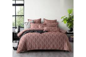 • features two sides of textured medallion designs in rust and pink. Dick Smith Ace Rust Quilt Cover Set Size King Bed Home Garden Children S Home Furniture Bedding Quilts Bedspreads Doonas