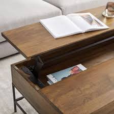 Crossover to contemporary style with the smooth architectural look of this 3 piece coffee table set. Industrial Storage Pop Up Coffee Table