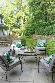 Place a few pretty outdoor pillows on your patio or front porch seating. Summer Simplified Simple Outdoor Decorating Ideas Driven By Decor Outdoor Decor Backyard Outdoor Patio Decor Backyard Decor