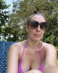 Temporary tattoos and crosswords at the beach with the girls ... because  why not? 😎☀️