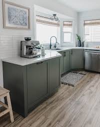 Their manufacturers generally offer matching spacers, or filler boards that are used to fill in gaps at the end of cabinet runs. Modern Olive Green Kitchen Before After Lemon Thistle