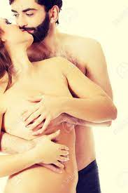 Handsome Man Touching Woman's Breast And Kissing Her. Stock Photo, Picture  and Royalty Free Image. Image 46076736.