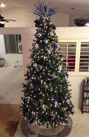 Blue living room decor ideas. Christmas Tree With Navy Blue Light Blue Silver And Crystal Ornaments Silver Christmas Tree Christmas Tree Themes Glam Christmas Tree