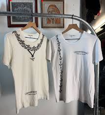 Comme des garçons x chrome hearts A rare collaboration from two extremely  sought after brands, featuring comme des garçons blanks with oversized  printed chrome hearts jewelry on them, these tees are from