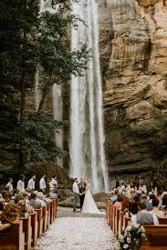 Forest Wedding Ceremony With Waterfall Backdrop Unusual Wedding Venues Outdoor Wedding Venues Unique Wedding Venues