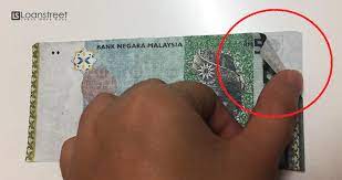 Simbol untuk myr dapat ditulis rm. Wanita Dapat Rm50 Palsu Dari Atm Apa Nak Buat Kalau Korang Kena