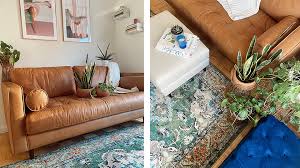 In this design from ​ happy interior blog, houseplant expert igor josifovic piles on the textiles in his tiny living room with a cotton tapestry and kilim pillows to dress up a budget sofa. Small Apartment Decor Ideas Make Your Space Look Bigger Better Stylecaster