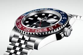 Black dial with dot hour markers, case diameter: Rolex Gmt Master Ii In Steel With Pepsi Bezel And Jubilee Bracelet