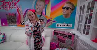 We have nice tall ceilings. the living room also features carpeting, brown leather couches and decorations, which jill's sisters helped display. Jojo Siwa Bought A New House And Here S What The Inside Looks Like