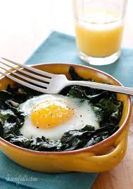Baked Eggs With Wilted Baby Spinach Recipe Food Recipes Healthy Eating Breakfast Recipes