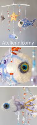 Mobile Poissons En Laine Feutree Perles Et Bois Flotte Creation Atelier Nicomy Crochet Earrings Crochet Mobile
