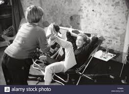 Simone Signoret And Her Daughter Catherine Allegret Attending Yves Montand S Private Performance At Their House In Autheuil Authouillet Normandy 17th September 1958 Stock Photo Alamy
