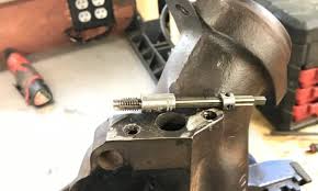 If you can, and try the drill bit sized screwdriver first, you may be able to 'untwist' the drill bit. How To Remove A Broken Drill Or Tap With Videos Make It From Metal
