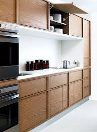 15 Storage Ideas To Steal From High End Kitchen Systems Minimalist Kitchen Wooden Kitchen Kitchen Design
