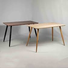 Featuring looped metal legs, and a black coated wooden table top, it's sure to elevate your dining room look. Wooden Rectangle Dining Table Only With Iron Legs 120x70 Cm