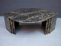 The coffee table with white genuine marble top is accompanied by a walnut finished base creating a polished clean look, perfect for any living room or den. Vintage Italian Marble Coffee Table 1970s 156894