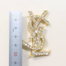 ysl brooch gold