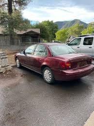 Image result for Bright Red 2001 Saturn