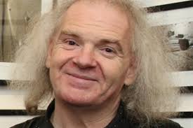 Sadness in the town he loved so well as Denis Collins laid to rest