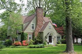 There are a lot of trees around the house and therefore a lot of leaf litter so white is out. First Home What Every First Time Home Buyer Needs To Know About Purchasing Their First Home Brown Roof Houses Brown Roofs Exterior House Colors