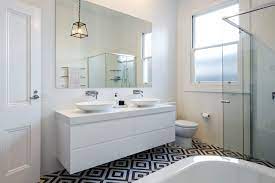 A dazzling way to add light to your bath. How To Choose A Bathroom Mirror