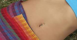 British Woman S Belly Button Explodes On Plane Bellybutton Piercings Belly Button Piercing Jewelry Belly Piercing Ring