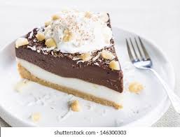 It's a rich chocolate pie with a coconut haupia layer and topped with whipped cream. Decadent Haupia Chocolate Custard Pie Topped Stock Photo Edit Now 146300303