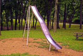 People may take turns between riding and spinning. Playground Equipment Then And Now All Inclusive Rec