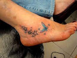 Butterfli With Stars Tattoo Pictures At Checkoutmyink Com Tattoos For Women Foot Tattoos Tattoos For Kids