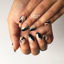 Foil Gold Black Nail Art Design Winter Nail Trends Ecemella Nail designs | easy nail art designs and cute nail polish.
