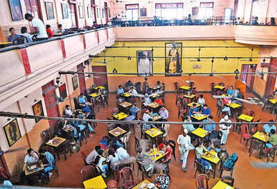The iconic hall of Indian Coffee House, AI generated