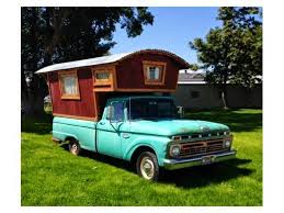 It has a 30 gal water tank, composting toilet hidden under. Gypsy Wagon Truck Camper Hq