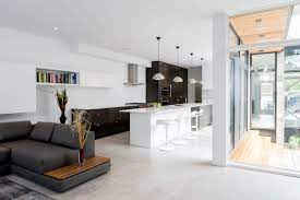 This pure white seamless floor opens the room and introduces customers to clean and striking colours. White Epoxy Floor My Decorative
