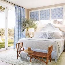 Idea spotlight add a touch of romance and sophistication by outfitting your bedroom with a beautiful chandelier. White And Blue Coastal Bedroom Design Ideas
