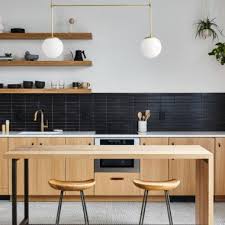 Modern Scandinavian Kitchen With Black And White Matte Tile Floating Wood Shelves Scandinavian Kitchen New Kitchen Cabinets Kitchen Cabinets Black And White
