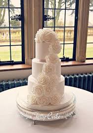 Check spelling or type a new query. White Rose Cascade Wedding Cake Wedding Cake Roses White Wedding Cakes Wedding Cakes With Flowers