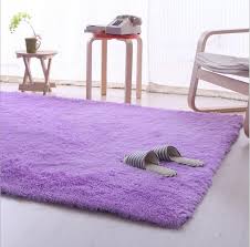 Choose one with the same width as your sofa, or go big with a rug that goes under the sofa to create a living room island. Purple Fluffy Rugs Anti Skid Shaggy Area Rug Carpet Floor Mat Home Living Home Garden Area Rugs