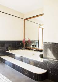 Maybe you would like to learn more about one of these? Black Marble Surrounding Bathtub In Luxury Bathroom Design Elegant Stock Photo 199751124