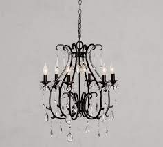 Farmhouse's rustic, reclaimed feel combines vintage or distressed items with delicate accents like potted flowers and airy open shelving for a timeless look. Celeste Crystal Chandelier Pottery Barn