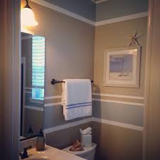 Some of the best color ideas for painting a bathroom is mixing pale gray ceiling with embellished gray walls and wooden framing. Pin By Carrie Williams Sterling On Bathroom Decor Beach Bathroom Decor Painting Bathroom Bathroom Decor