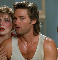 So, considering big trouble in little china, kurt russel (the big trouble) is shown to be so much larger in the image than everyone else (the little china). Big Trouble In Little China Kurt Russell Jack Burton Character Profile Writeups Org